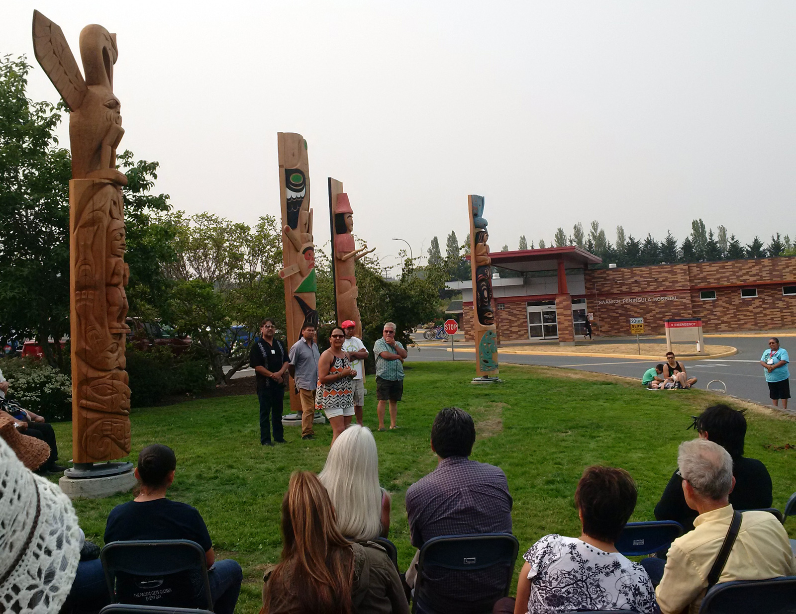 lydia-hwitsum-in-front-of-totem-poles.jpg